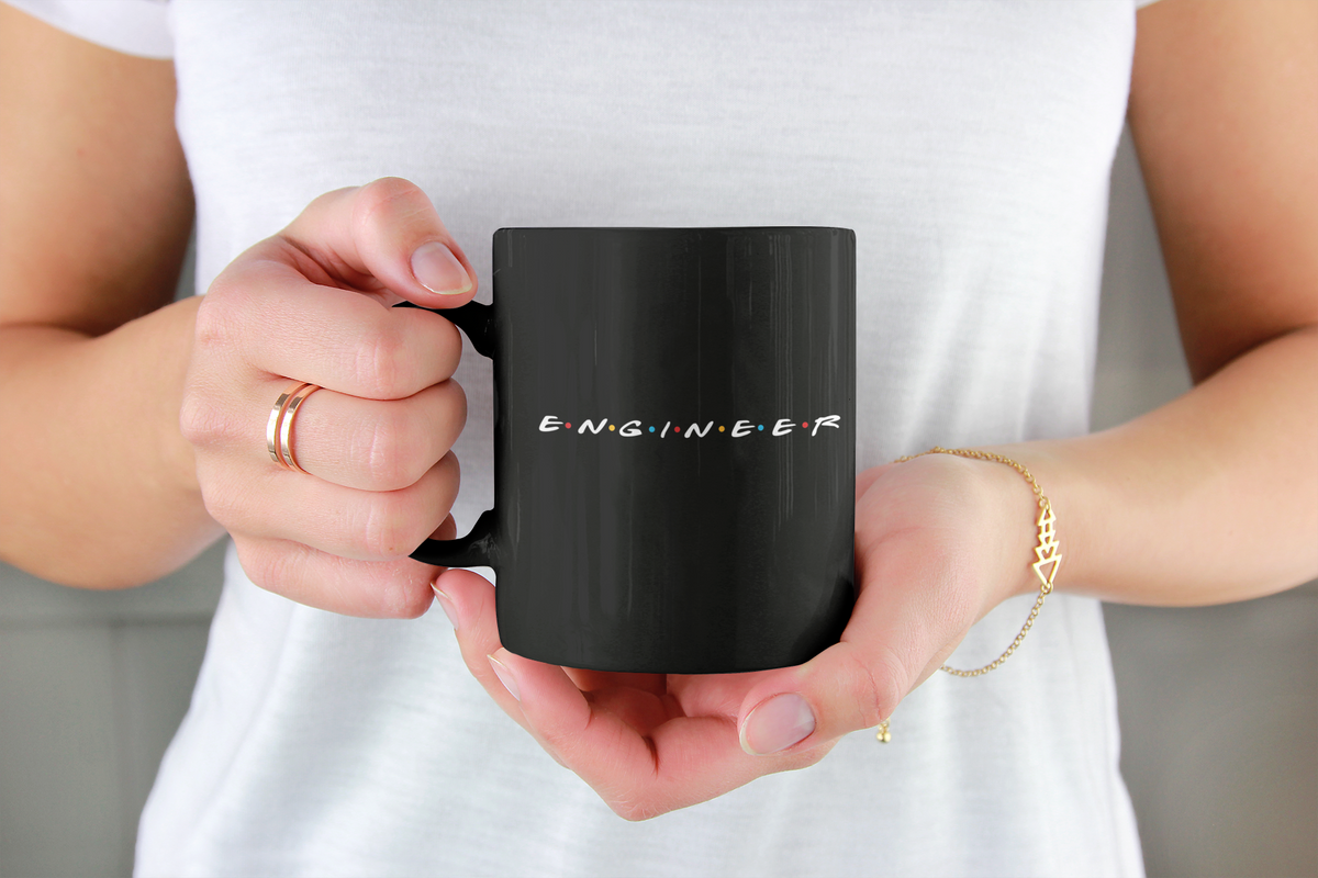 http://engineer-freedom.com/cdn/shop/products/drinkware-mockup-of-a-woman-holding-an-11-oz-coffee-mug-2954-el1_1200x1200.png?v=1612994659